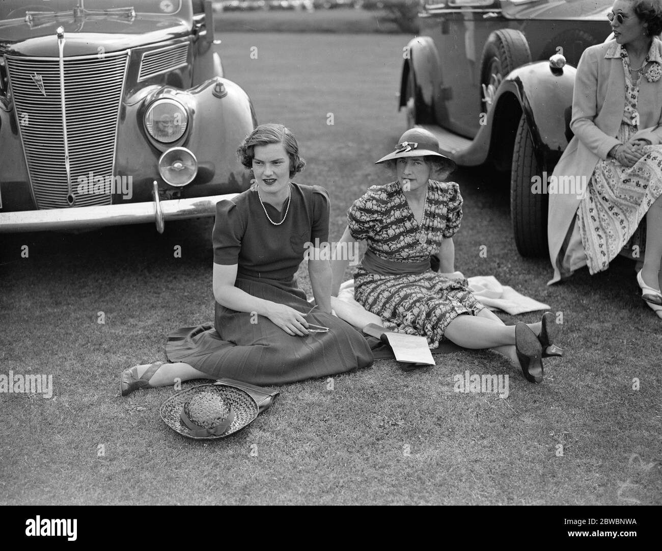 Watching the Polo at Cowdray Park at Midhurst in Sussex , Miss Veronica Harrison with Mrs Harrison . 1938 Stock Photo