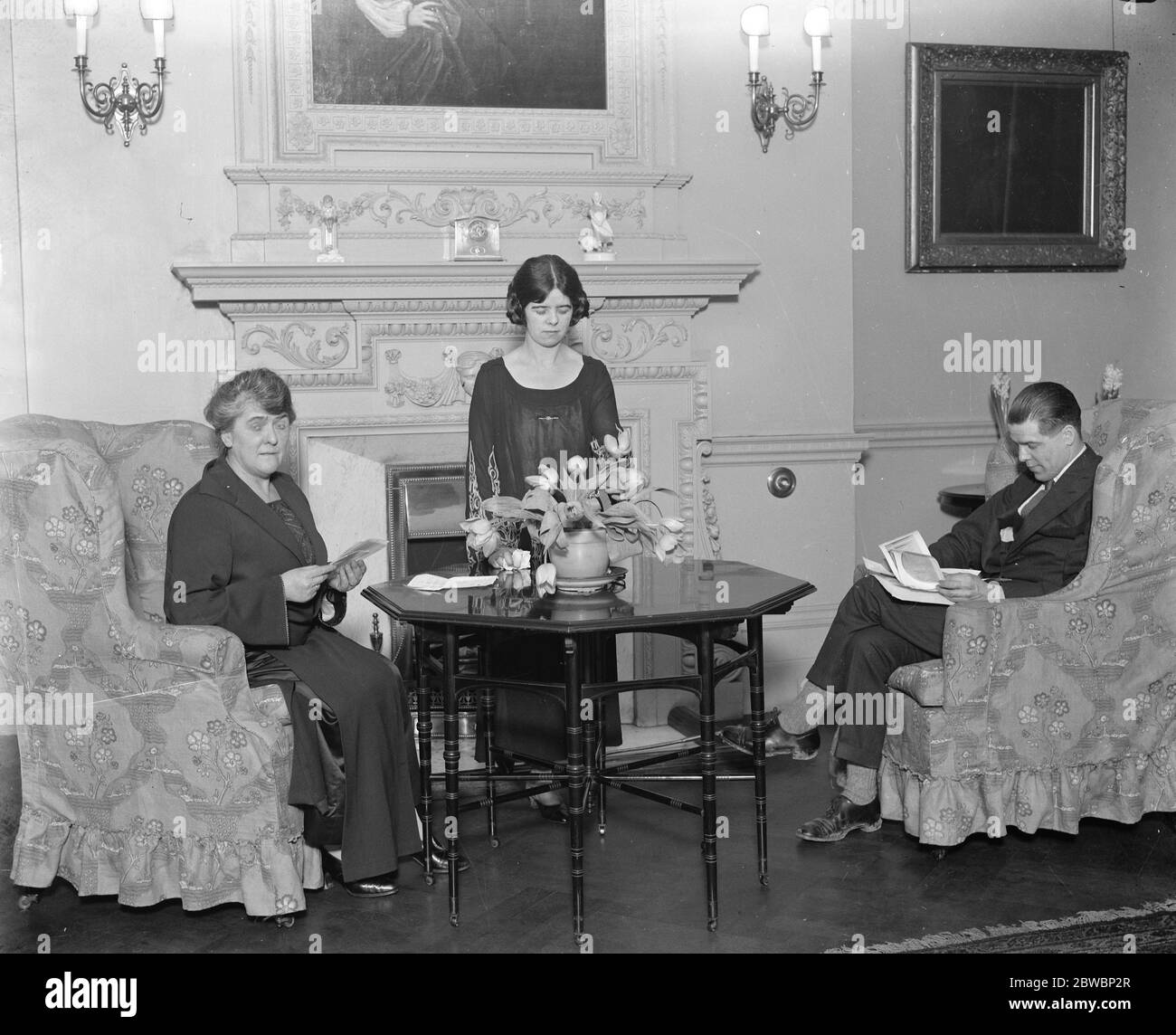 The deputy leader 's familty at home . Mrs J R Clynes , the wife of the deputy leader of the House , photographed in her new home , No 11 Downing Street with her daughter Mabel , and son , Mr J H Clynes who acts as private secretary to his father . 8 February 1924 Stock Photo
