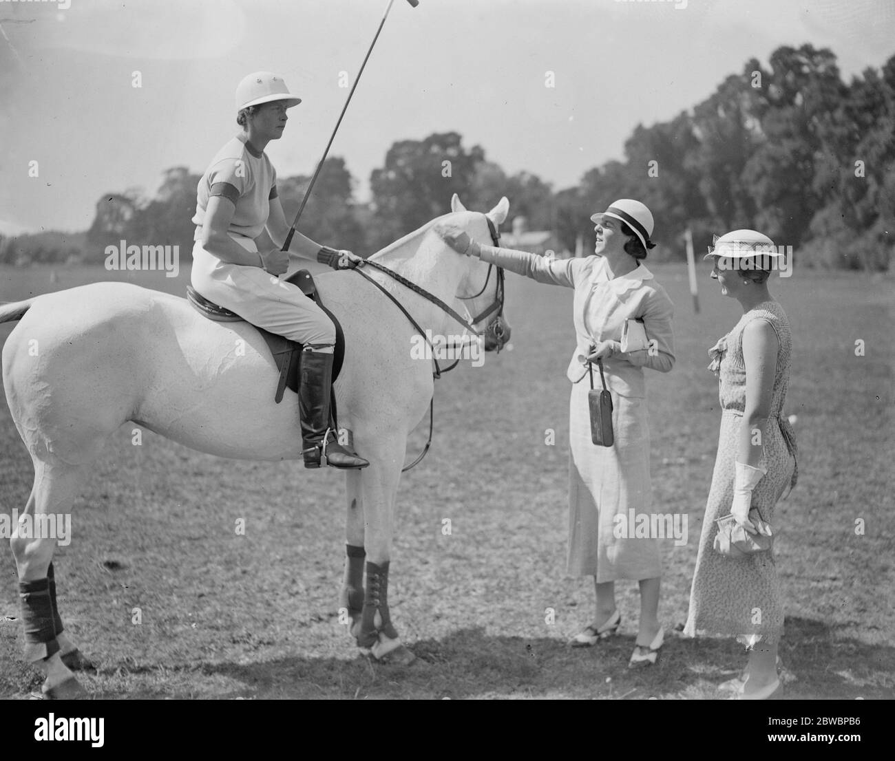 Ladies Polo at Ranelagh - Oddments versus Valkyrie Mrs Merckel ( Oddments ) talking to friends 6 July 1934 Stock Photo
