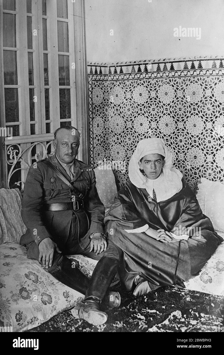Spain ' s Soldier Champion in Morocco . General Primo de Rivera , the Mussolini of Spain , met El Jaladi son of the famous Raisuli in Morrocco . General Rivera with the French General Chambrun , Chief of the Fez Region , sent as the representative of the French Resident in Africa to confer with him on policy in Morocco . 26 July 1924 Stock Photo