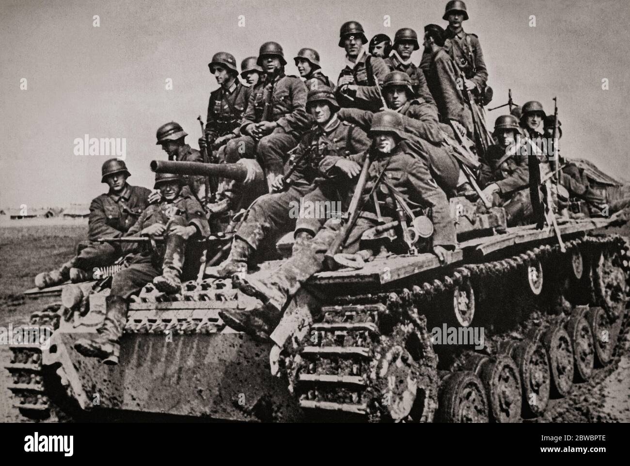 Following the start of Operation Barbarossa, which began on 22 June 1941, German troops take a lift on a German Tank as they advance on Moscow, Russia. Stock Photo