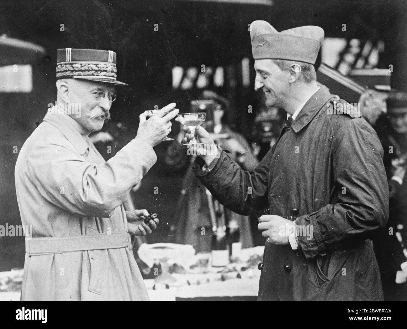 Seven American airmen volunteer to fight for Sultan of Morocco against the Riffd General Dumesnil and Colonel Sweeney ( the commander ) toasting the health of the aviators 7 August 1925 Stock Photo