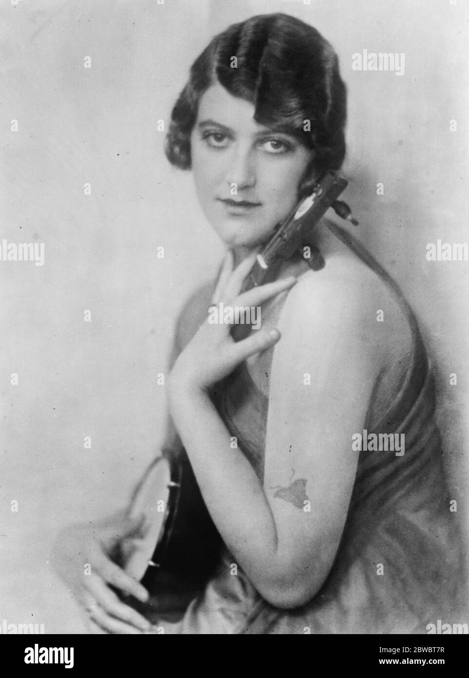 Thank You , Doctor  . A new study of Mai Bacon , the popular revue actress , who is to appear at the London Coliseum in a comedy sketch ,  Thank You , Doctor  . 23 September 1925 Stock Photo