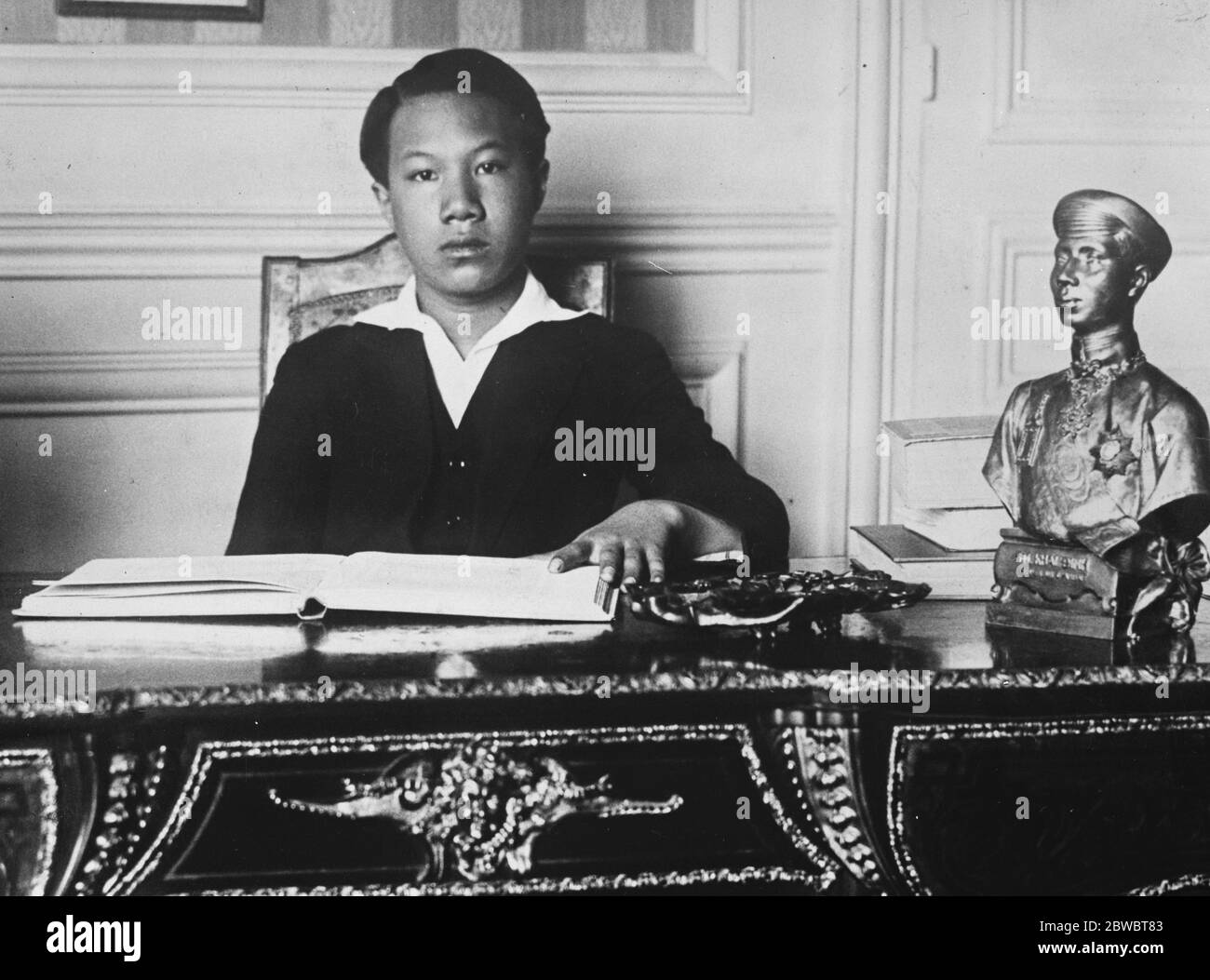 Emperor Bao Dai of Annam begins his studies in Paris . The youngest Emperor in the World Bao Dai who is only 12 years of age , is seen starting his studies after returning from Annam where he was present at his father ' s funeral . 29 March 1926 Stock Photo
