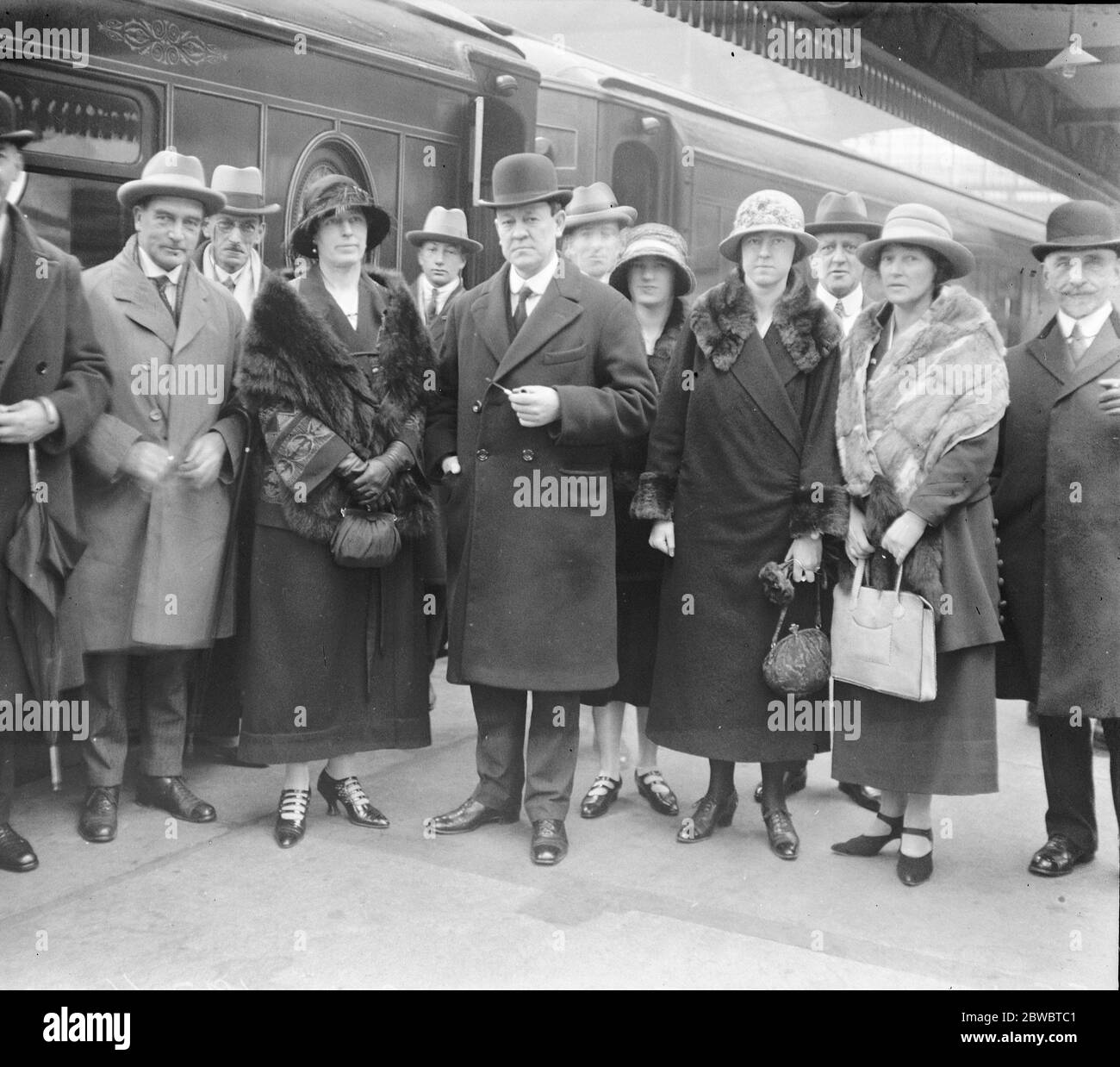Senator Wilson returns to Australia . Senator Wilson left Victoria Station en route for Australia . Senator Wilson with his wife and two daughters and staff . 10 May 1924 Stock Photo