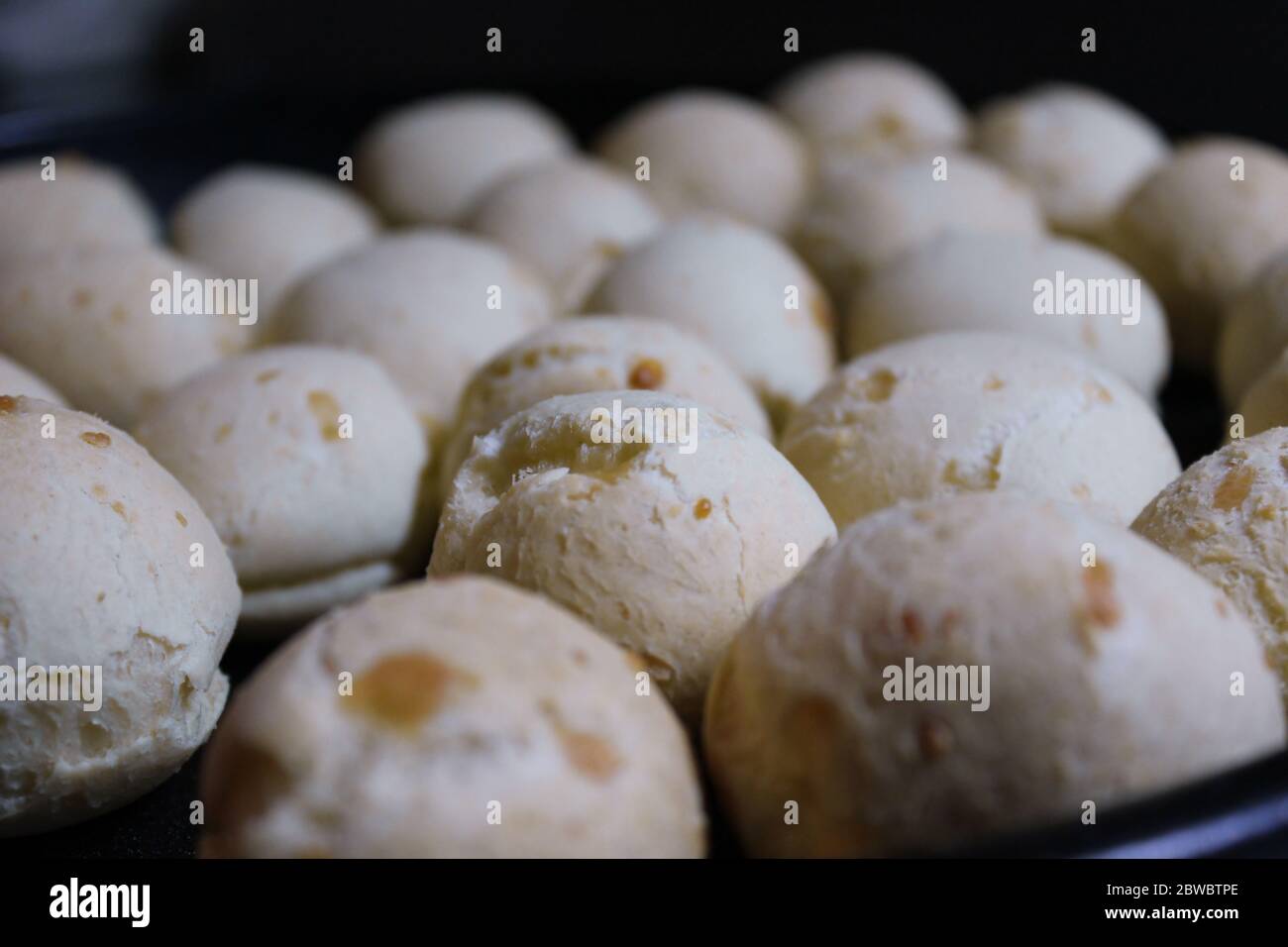 A close up of round cheese bread rolls know as chipa in Argentina and Paraguay. Stock Photo