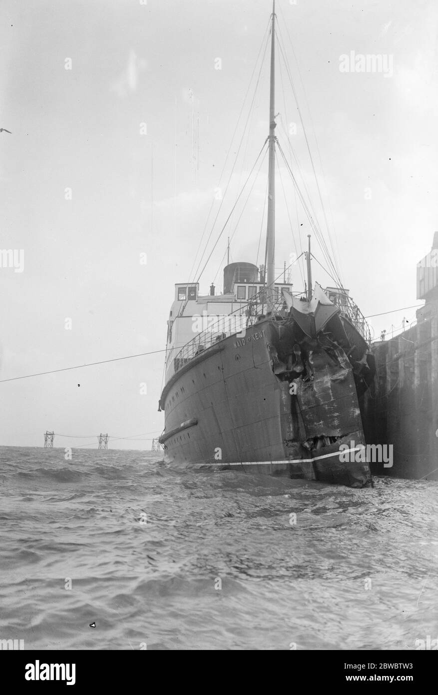 Channel steamer in a crash . The Maid of Kent , the Southern Railway Co 's cross Channel steamer , with her bows badly buckled by her collision with the breakwater as she was leaving Dover for Calais with 400 passengers . 20 March 1926 Stock Photo