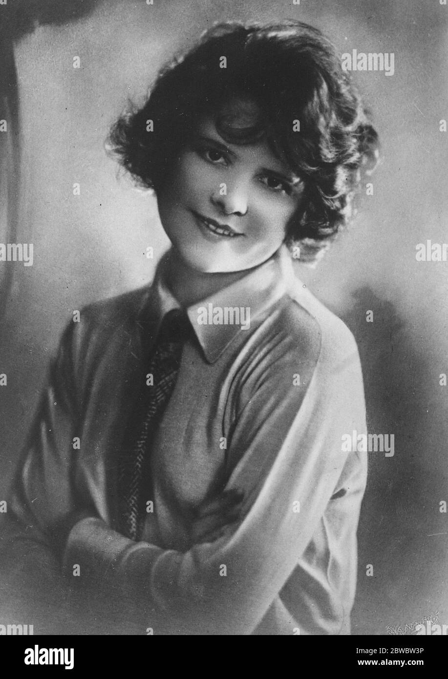 Titled beauty ' s golden kisses . Baroness Haymerle who at a charitable fete in aid of a fund for distressed cinema artists , raised £ 1500 by auctioning kisses . 29 December 1926 Stock Photo