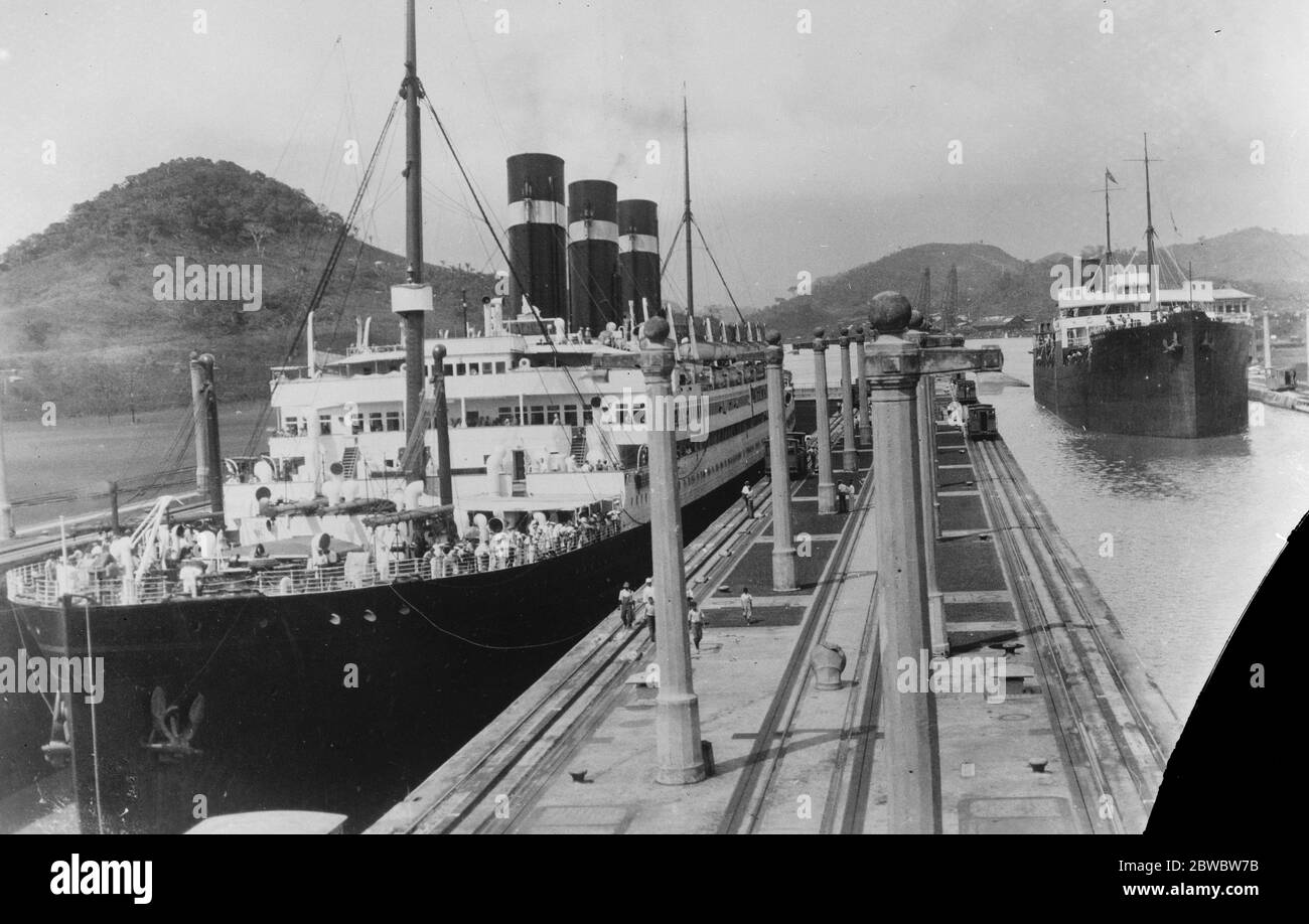 Lowering a liner after a world 's tour . The SS Belgenland , after completing its third world cruise , is here seen in the west chamber of the Pedro Miguel look after having been lowered 28 ft to the Miraflores Lake level . 18 January 1927 Stock Photo