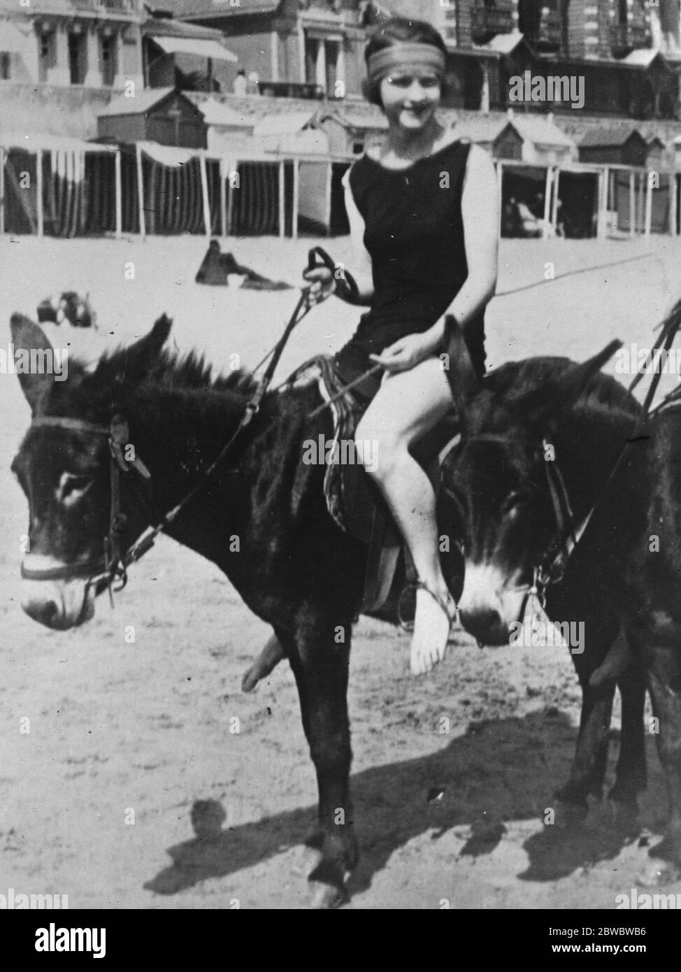 French girl 's story of alleged Englishmen  spies  . A sensation has been caused by the arrest in Paris of three Englishmen , Messrs J H Leather , E O Phillips and W Fischer , on allegations of espionage at French aviation centres . Marthe Moreuil stated that she was spying for a foreign Power . Marthe Moreuil photographed on a donkey at La Baule . 10 December 1925 Stock Photo