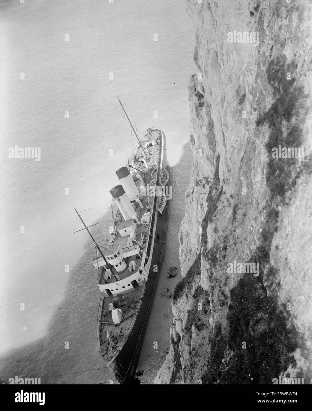 SS  Newhaven  ashore . The first attempt to float the famous cross Channel steamer  Newhaven  which went aground on the sands at Dieppe , were made on Tuesday , and although four tugs were used , it was found impossible to move the vessel . 14 August 1924 Stock Photo