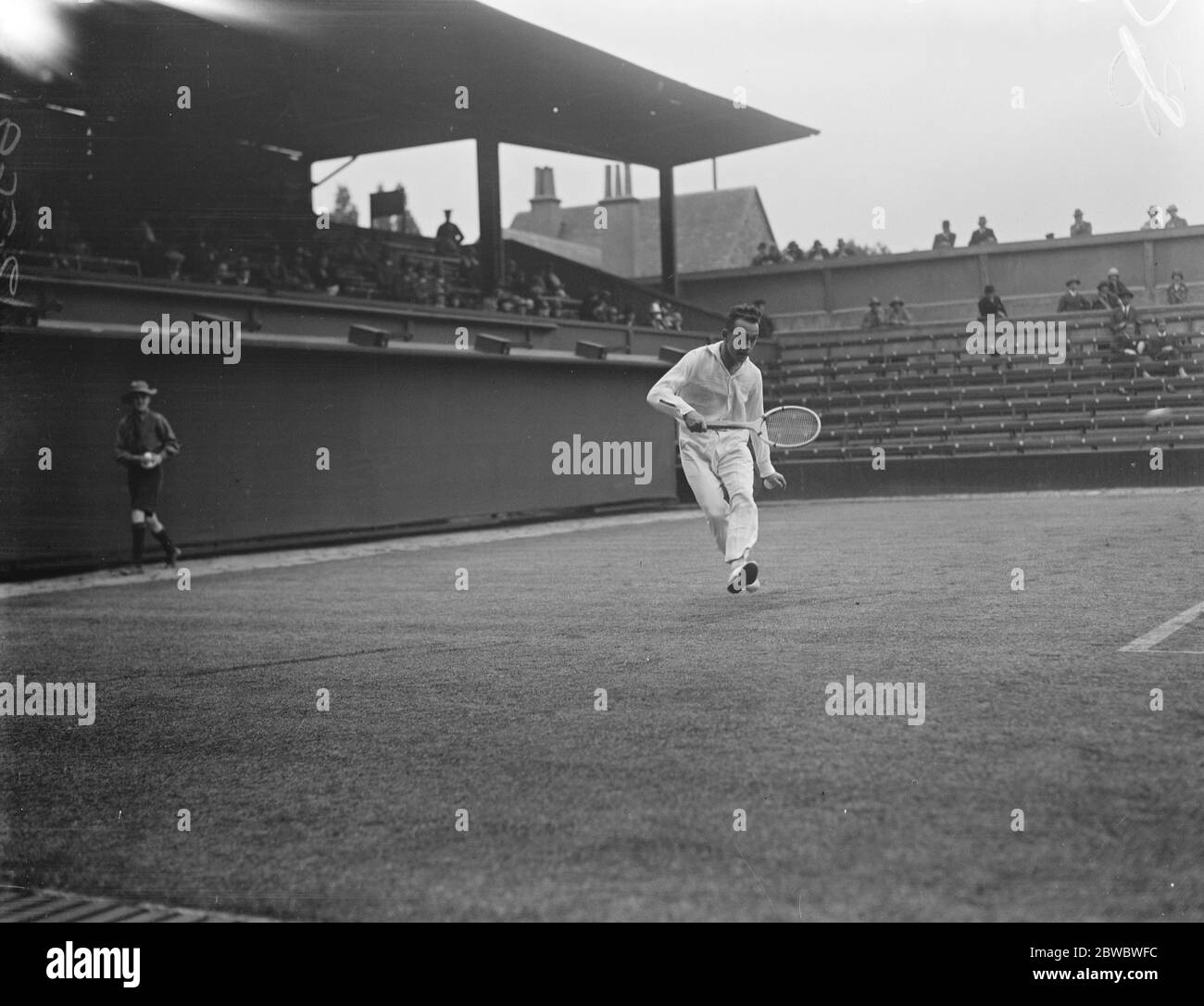 Lawn tennis championships at Wimbledon . H Cochet in play . 22 June 1925 Stock Photo