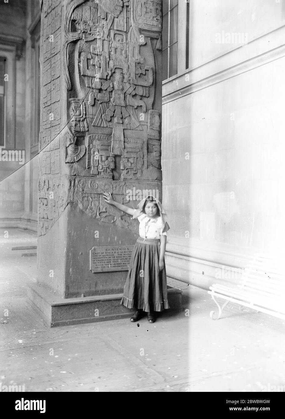 One of Maya Kekchi people visits England . Mr F A Mitchell Hedges delivered a lecture at the British Museam dealing with his discoveries in the interior of British Honduras . An interesting figure was an Indian girl of the Maya Kekchi race . The Indian girl with the great stone monolith , erected by the Maya . 10 January 1926 Stock Photo