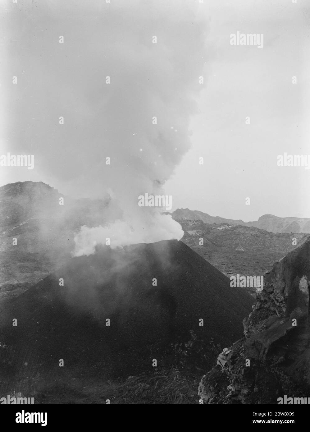 Small crater inside large crater of Vesuvius . 1926 Stock Photo