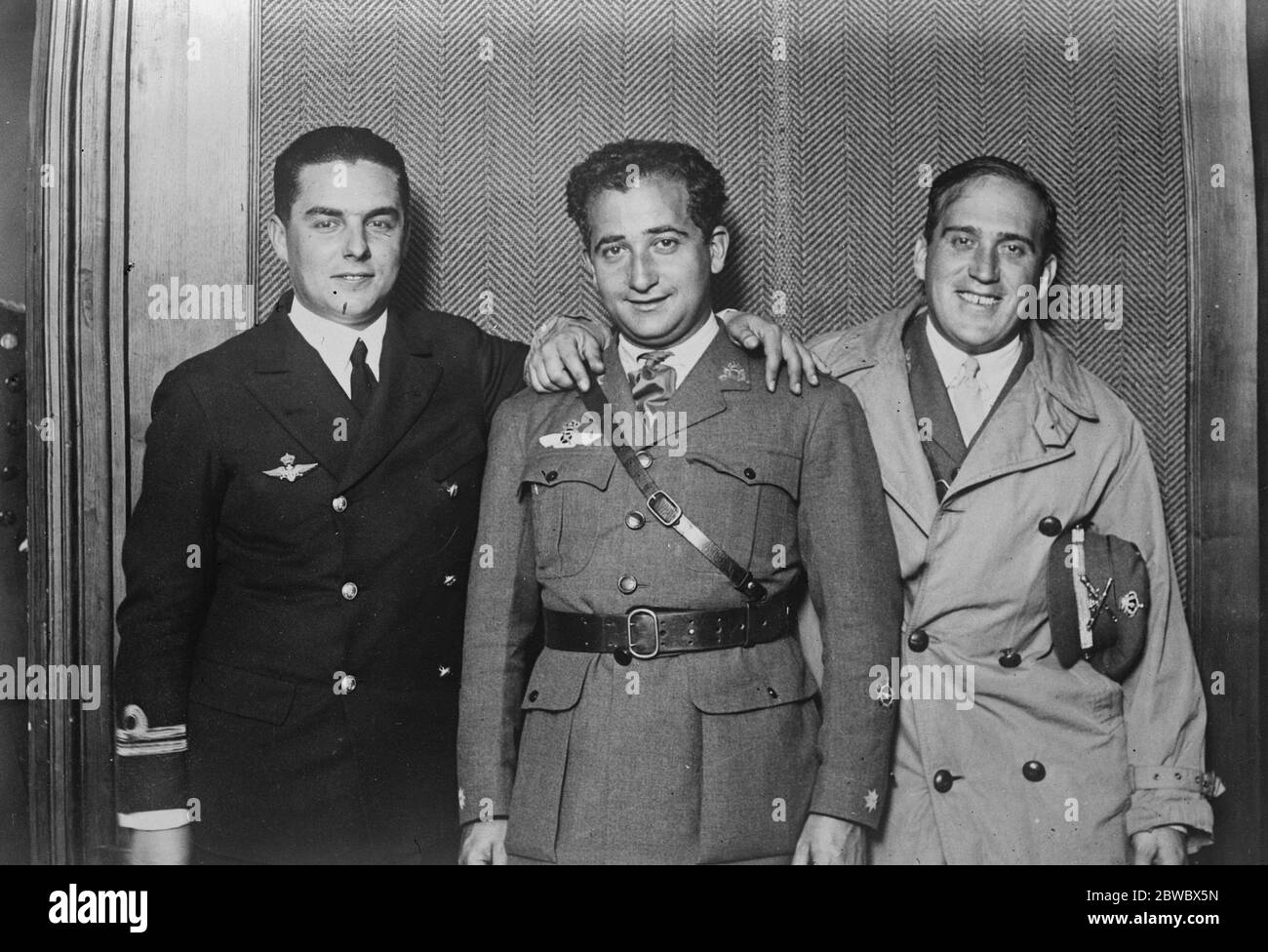 Spain South America flight . Commandant Franco , the organiser of the projected flight from Spain to South America , announces that it is now practically certain he will start for Buenos Aires on January 23 . Commandante Franco ( centre ) with Captain Ruiz ( right ) who will accompany him . and Lt Duran , who , as representative of the Navy will make part of the journey in the seaplane and the remainder in the destroyer ' Alecado ' . 18 January 1926 Stock Photo