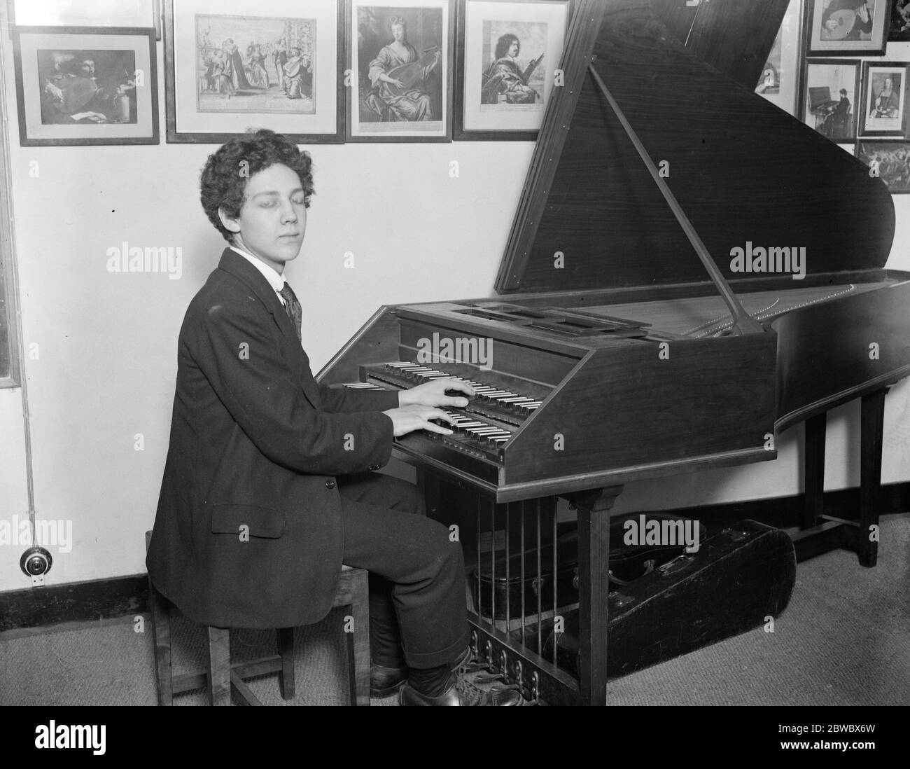 Preparing for Haslemere Festival of old chamber music . Famous family who make old time instruments . Ridolf Dolmetsch , son of Mr Arnold Dolmetsch , playing the harpsichord . 23 January 1925 Stock Photo