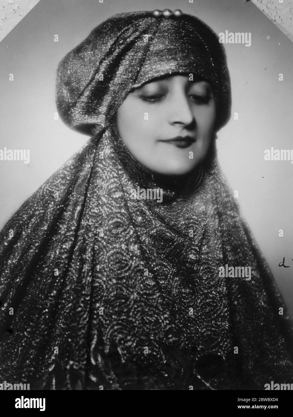 Dicktator of Turkish women 's fashions now in Paris . Helene Hanoum , wearing a Western adaption of the Eastern veil . The lady 's mission is to take back for the approval of Kemal Pasha a series of models suitable for general wear in Turkey . 11 December 1926 Stock Photo