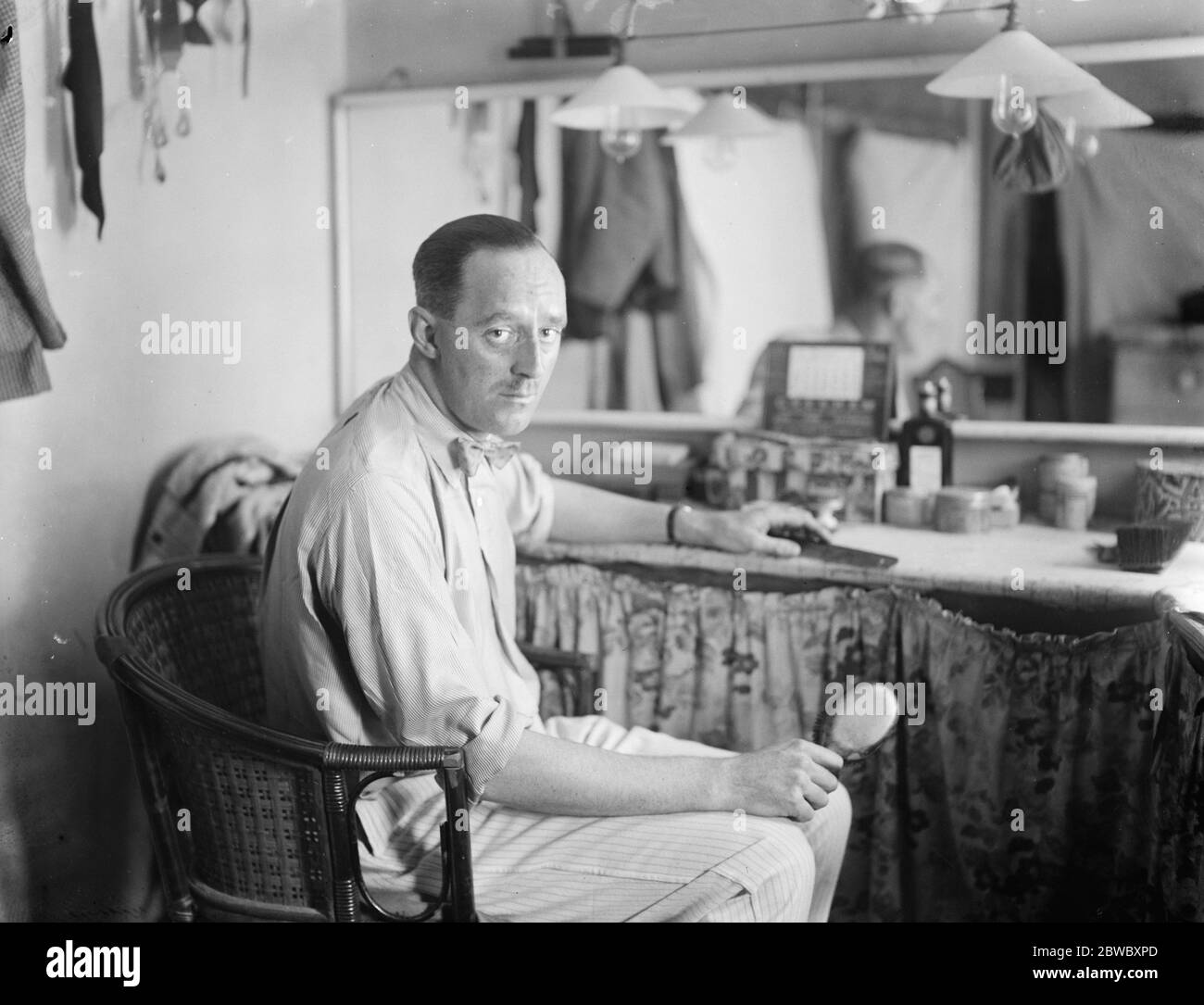 Earl is West End play . Earl Cowley is to appear in  Our Betters  at the Globe Theatre in the part of  Bertie  . Earl Cowley in his dressing room . 9 August 1924 Stock Photo