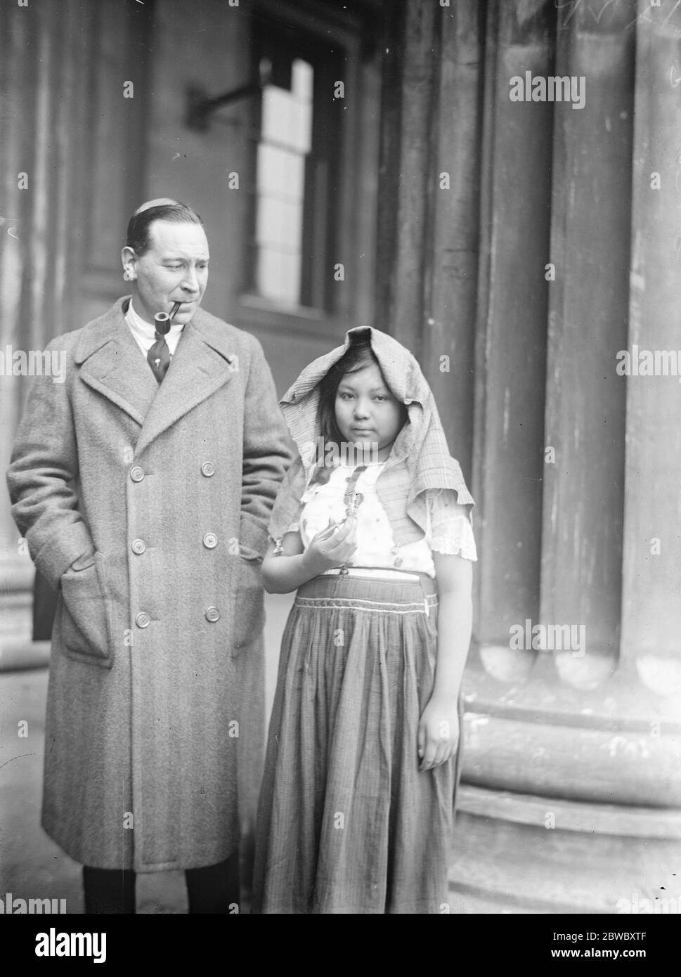 One of Maya Kekchi people visits England . Mr F A Mitchell Hedges delivered a lecture at the British Museam dealing with his discoveries in the interior of British Honduras . An interesting figure was an Indian girl of the Maya Kekchi race . The lecturer with the Indian girl . 10 January 1926 Stock Photo