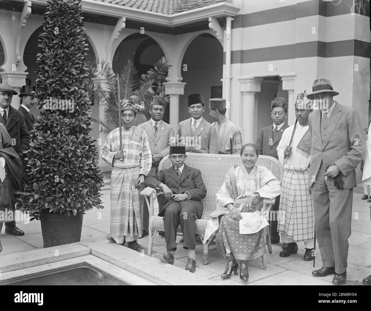 The Sultan of Perak at Wembley . The Sultan of Perak visited the Malay Pavilion at the British Empire Exhibition . The Sultan and his wife at the Pavilion . 19 May 1924 Stock Photo