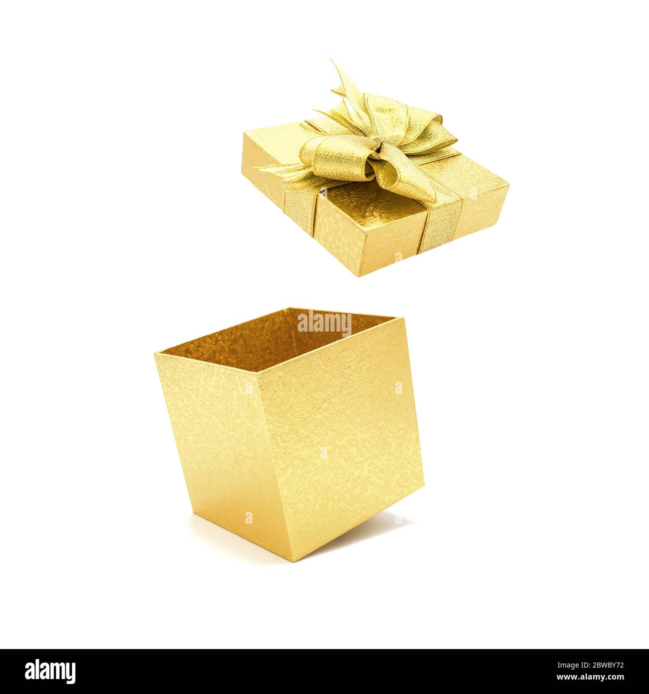 Gold gift box with bow open, isolated on white background. Stock Photo