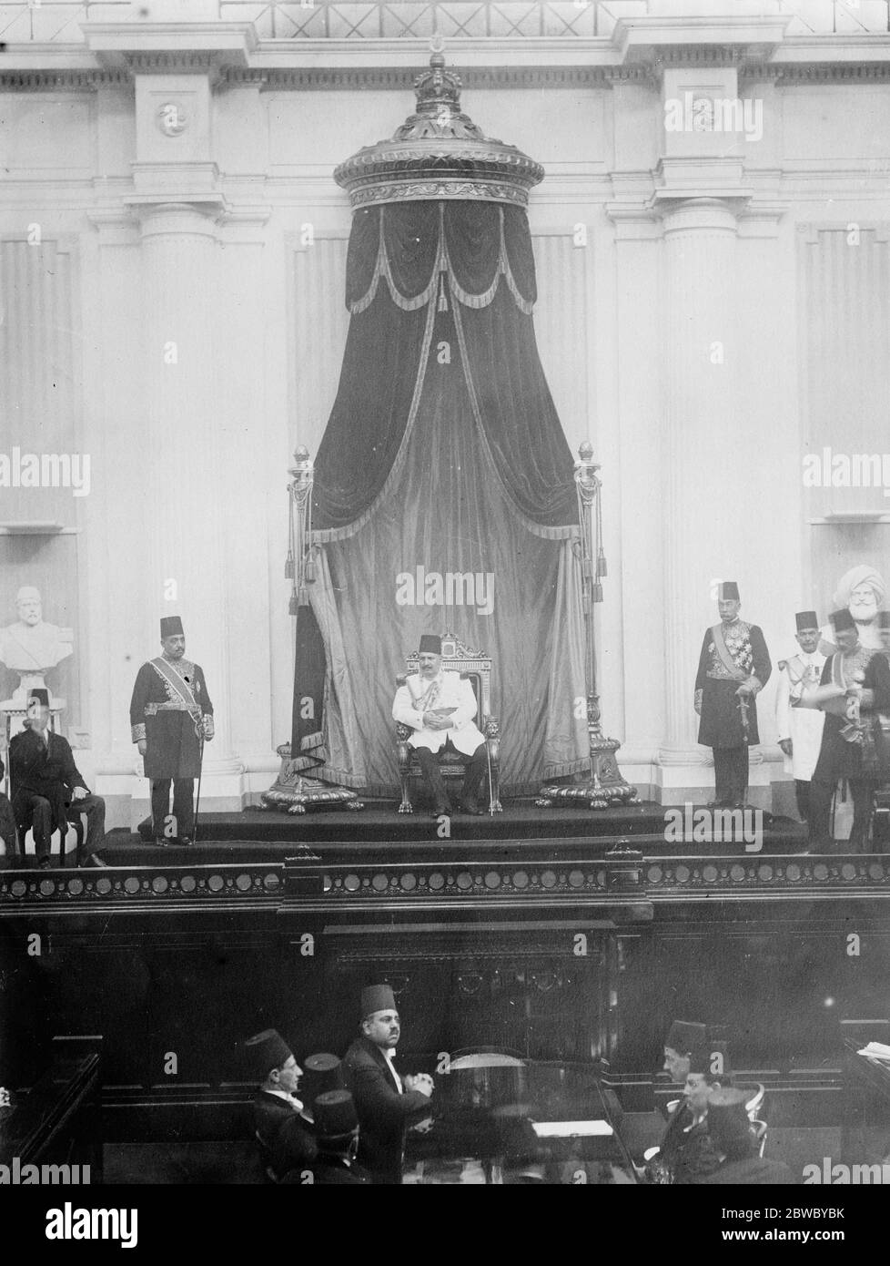 King Fuad opens Egyptian parliament . King Fuad ( centre ) listening to the address being read by Adly Pasha , the Prime Minister 24 June 1926 Stock Photo