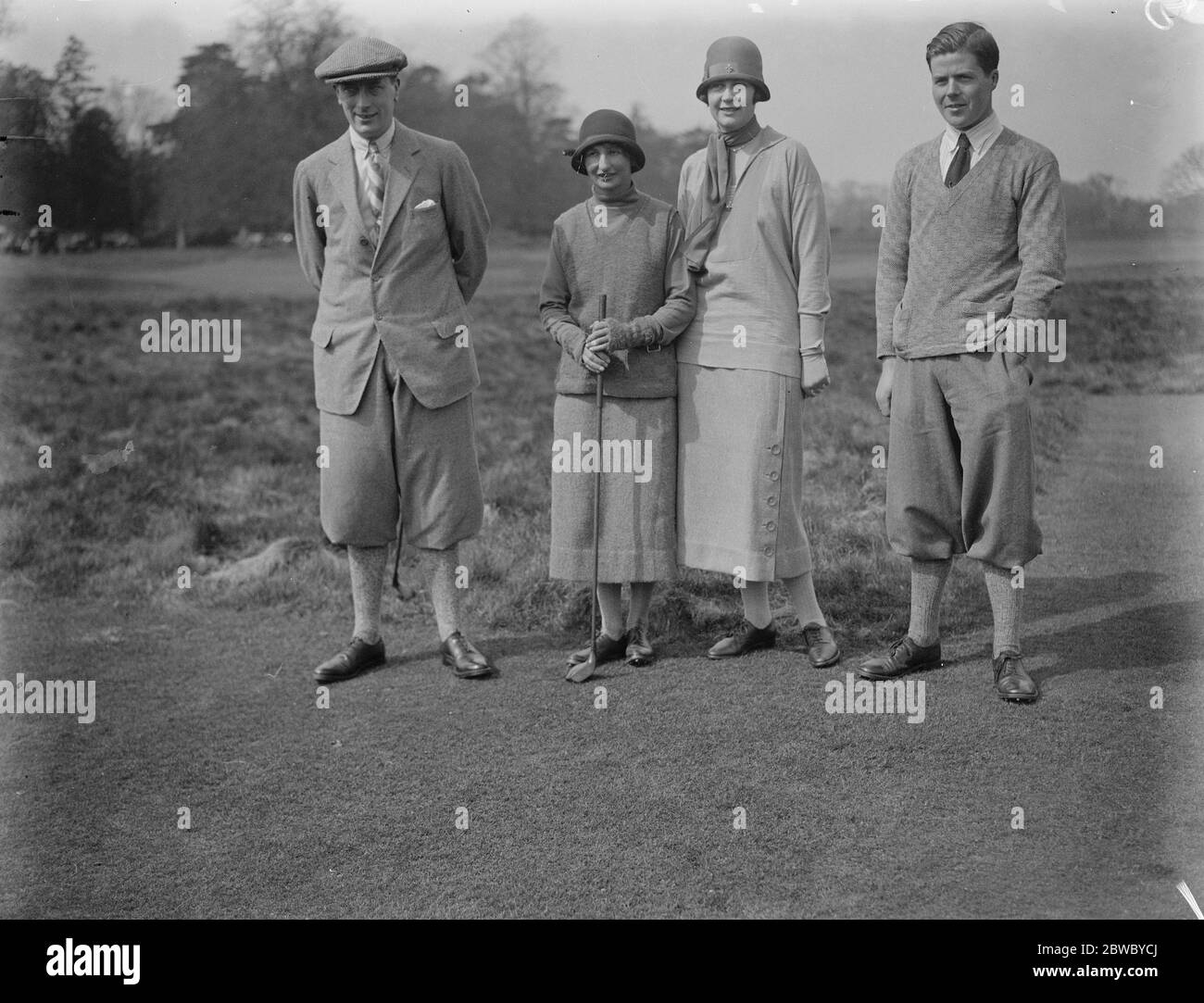 Golf match between ladies and gentlemen at Stokes Poges Left to right T A Torrance , Miss Maude Hunnewell , Miss Winn and Geoffrey MacCallum 2 May 1925 Stock Photo