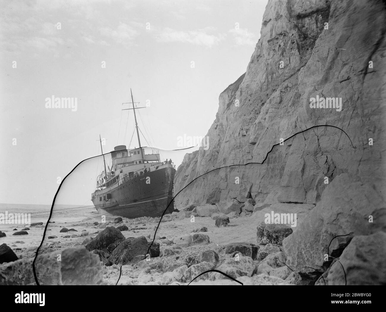 SS  Newhaven  ashore . The first attempt to float the famous cross Channel steamer  Newhaven  which went aground on the sands at Dieppe , were made on Tuesday , and although four tugs were used , it was found impossible to move the vessel . 14 August 1924 Stock Photo