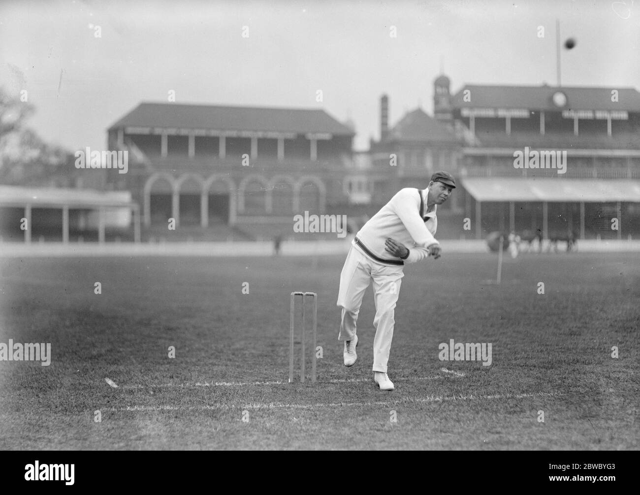 South African cricketers practice at the oval Cecil Donovan Dixon , one of the best medium paced bowlers in the team , bowling 25 April 1924 Stock Photo