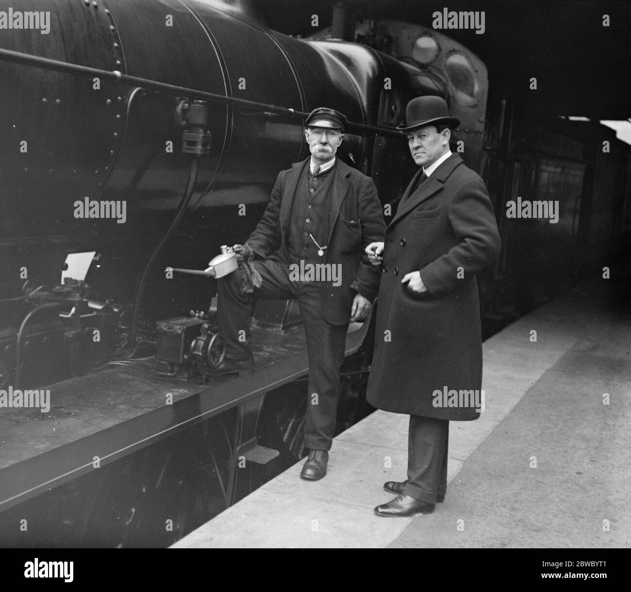 Senator Wilson returns to Australia . Senator Wilson left Victoria en route for Australia . He was seen off by Sir Joseph Cook , High Commissioner in London . Senator Wilson chatting with the engine driver . 10 May 1924 Stock Photo