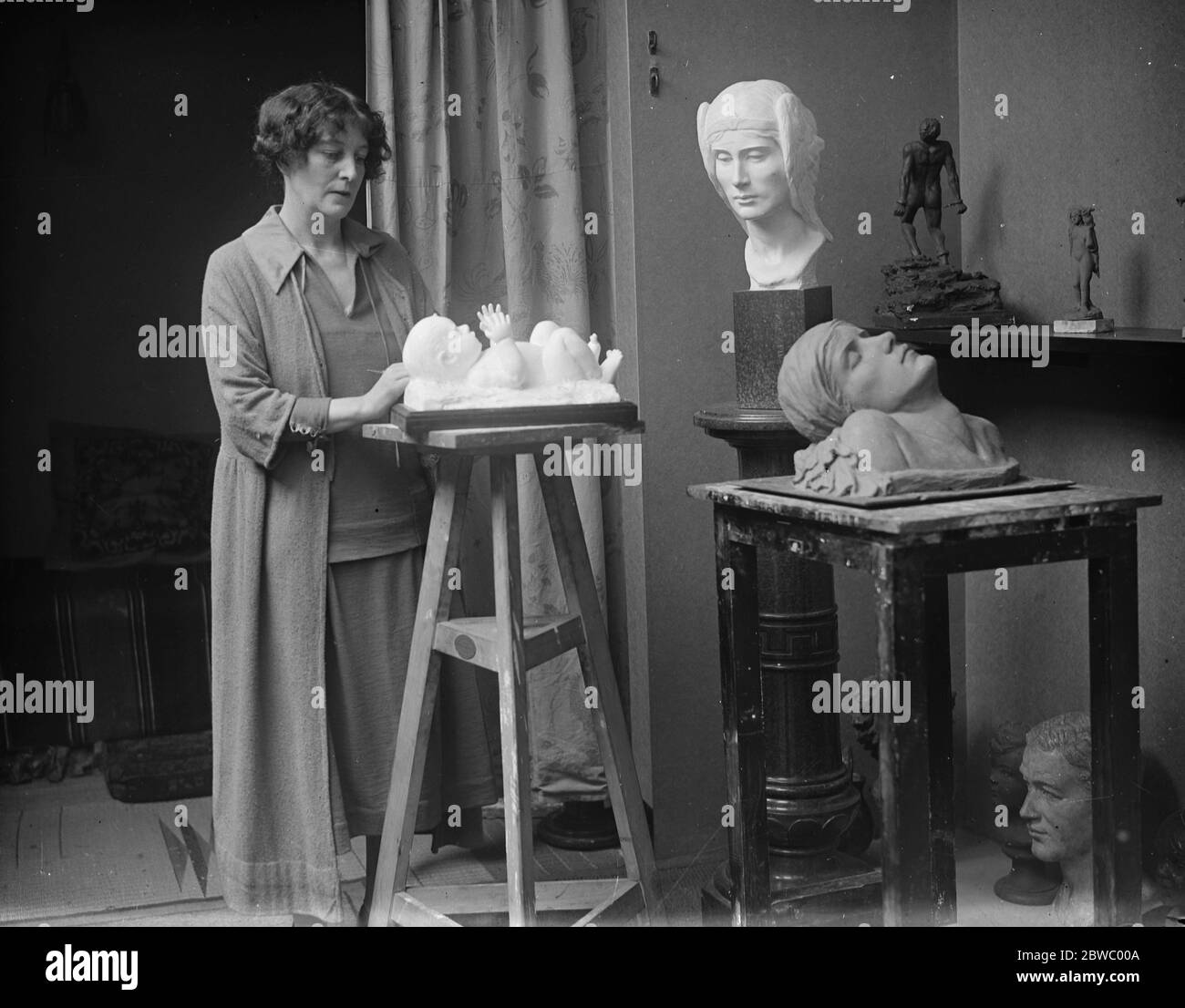 Titled sculptress to give unique dinner . Lady Welby , the talented sculptress , is shortly giving a dinner which will be a novelty even in art circles . All the guests to be invited have sat to her for their busts . Lady Welby in her London studio . 12 November 1925 Stock Photo