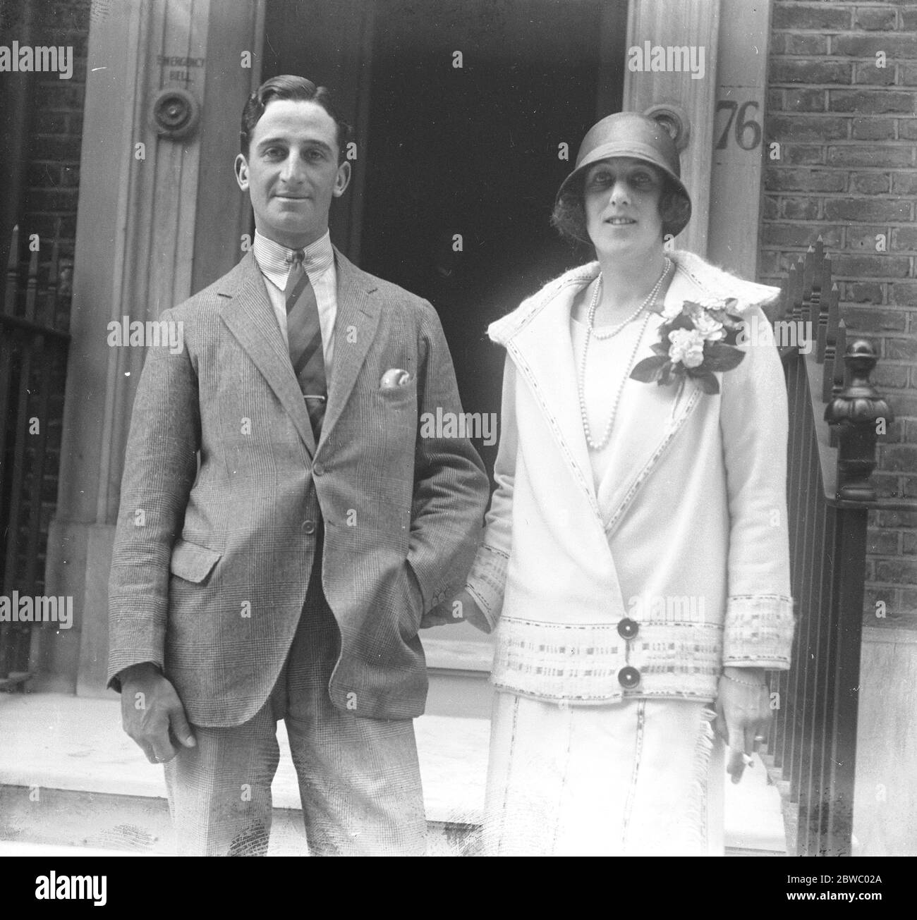 Countess of St Germans weds . Countess of St Germans , the Duke of Beaufort 's pretty widowed daughter to Captain Douglas on Tuesday . Bride and bridegroom photographed after the ceremony . 14 July 1924 Stock Photo