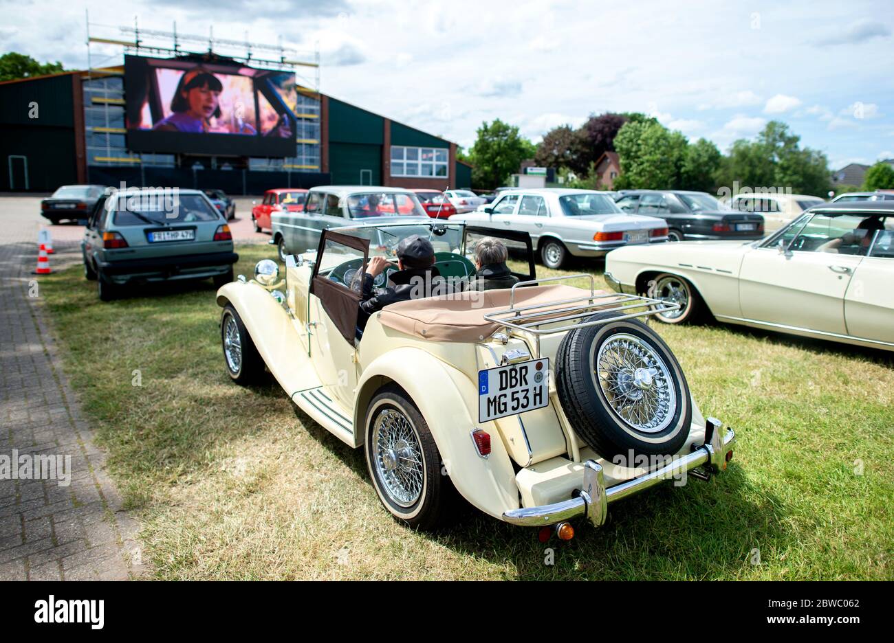 Hude Germany 31st May 2020 Vintage Cars Are Parked On The Grounds Of A Drive In Cinema In The Wusting District Several Hundred People In Their Oldtimers Youngtimers And American Classic Cars Took