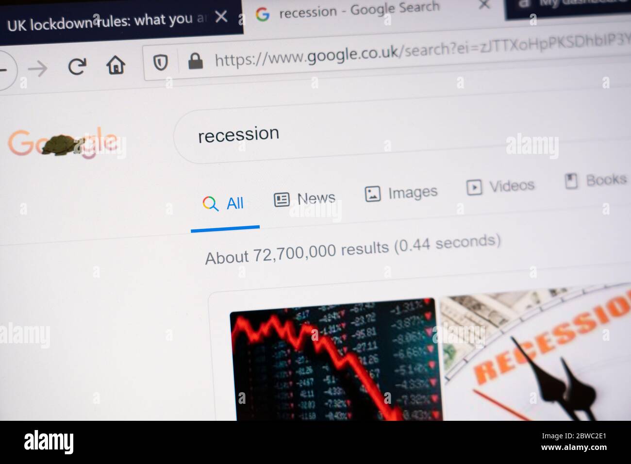 A computer screen showing the word 'Recession' as a Google search engine search term with the number of search results shown Stock Photo