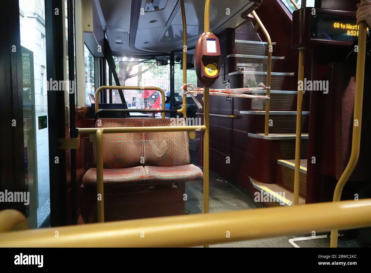 Hot Weather London 31.5.20 Bus with tape to keep people from driver ...
