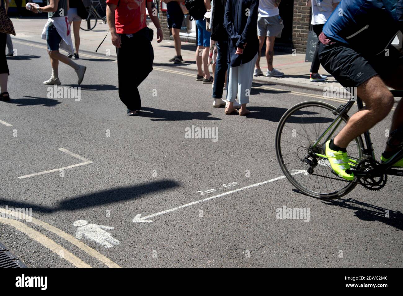 Hackney,London May 2020 during the Covid-19 (Coronavirus) pandemic. Broadway Market. Two metre markings. Stock Photo
