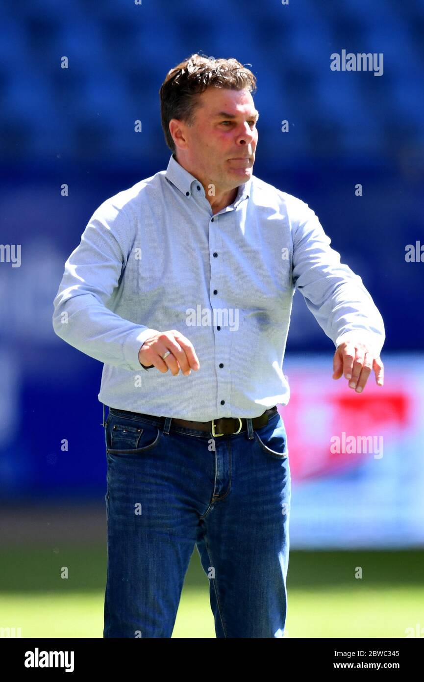 Karlsruhe, Germany. 31st May, 2020. Football 2nd Bundesliga, 29th matchday, Hamburger SV - SV Wehen Wiesbaden in the Volksparkstadion. Dieter Hecking, coach of Hamburger SV, stands on the sidelines. Credit: Stuart Franklin/Getty Images Europe/Pool/dpa - IMPORTANT NOTE: In accordance with the regulations of the DFL Deutsche Fußball Liga and the DFB Deutscher Fußball-Bund, it is prohibited to exploit or have exploited in the stadium and/or from the game taken photographs in the form of sequence images and/or video-like photo series./dpa/Alamy Live News Stock Photo