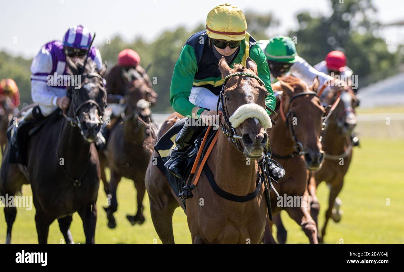 Hoppegarten, Germany. 31st May, 2020. Horse racing: Gallop, Hoppegarten Racetrack, second day of racing. Jockey Clement Lecoeuvre wins group race on Kalifornia Queen from the stable at Gestüt Röttgen Diana-Trial. Due to the coronavirus pandemic, the races are held without spectators. Credit: Andreas Gora/dpa/Alamy Live News Stock Photo