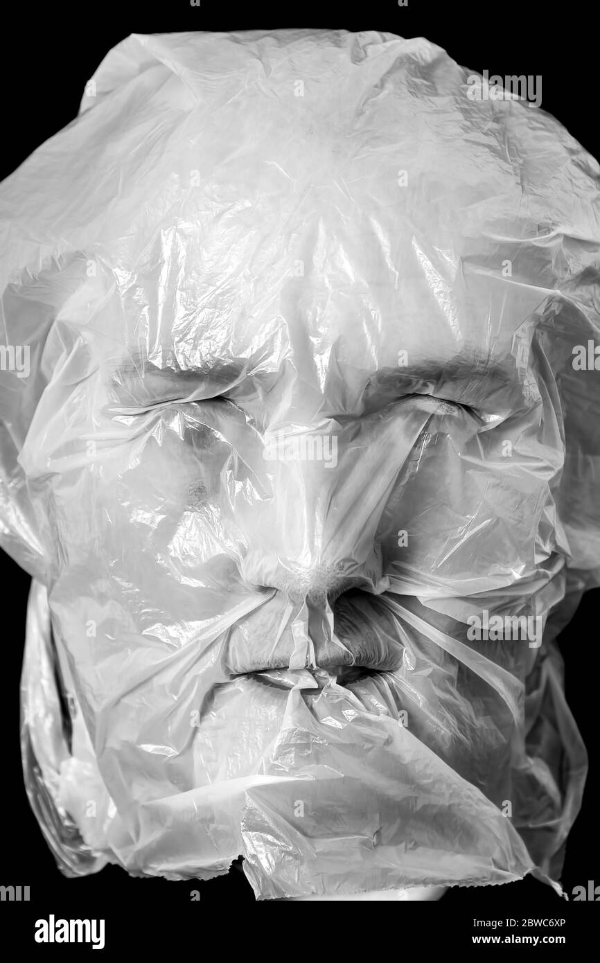Man plastic bag over head Black and White Stock Photos & Images Alamy