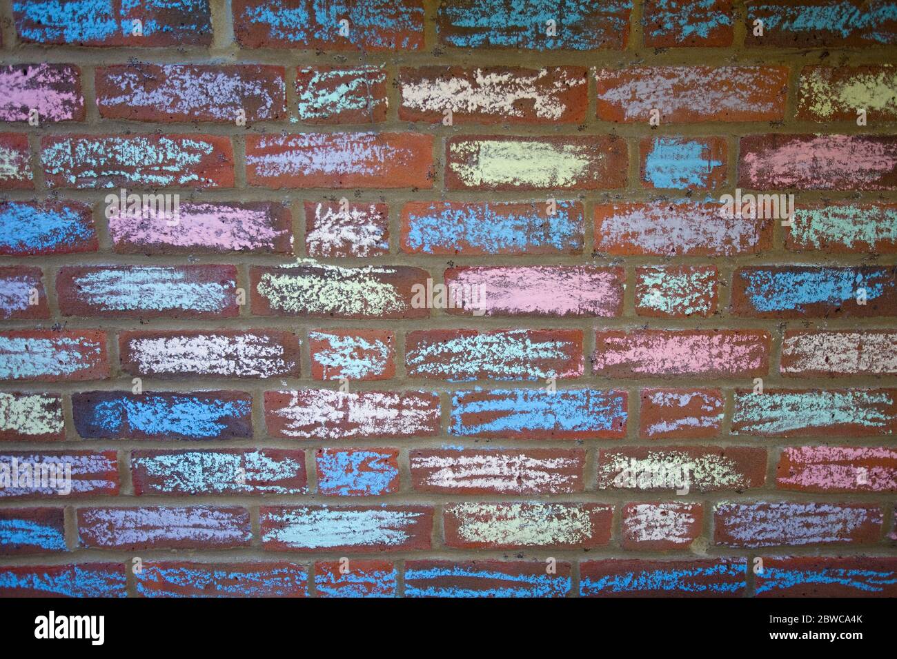 Chalk pastel painted house bricks, Uk Stock Photo