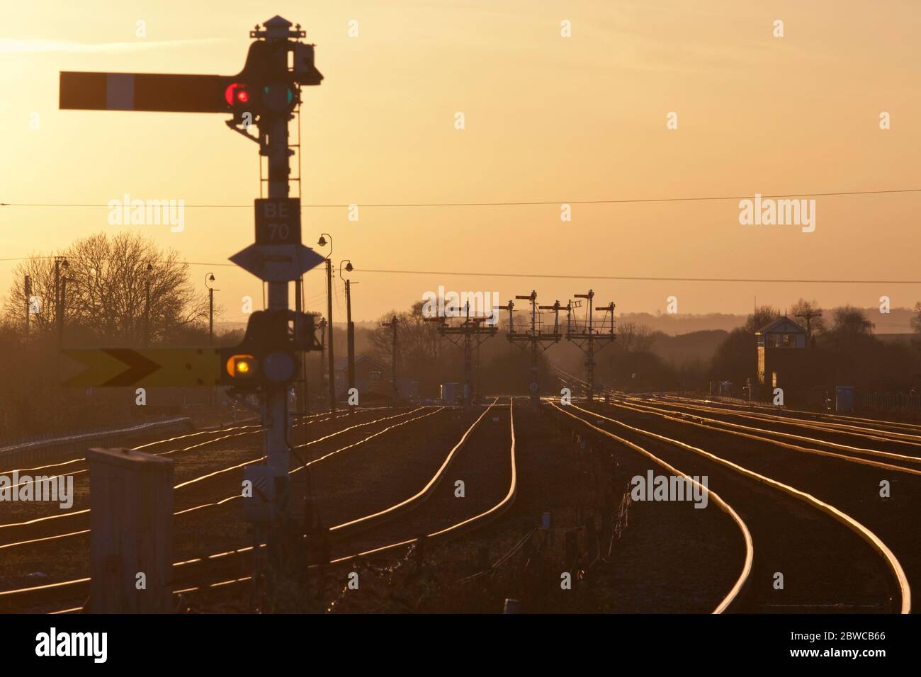 Wrawby Junction, Barnetby (Lincs) Sun setting over railway mechanical semaphore railway signals just before they were replaced Stock Photo