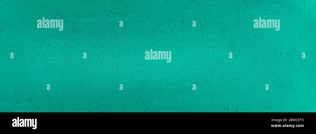 Turquoise painted wall texture. Panoramic turquoise wall background Stock Photo