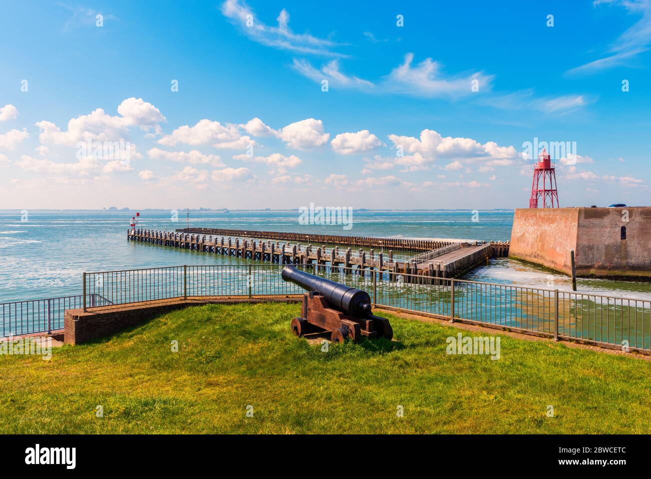 Cannon and Lighthouse in Vlissingen Zeeland Netherlands Stock Photo