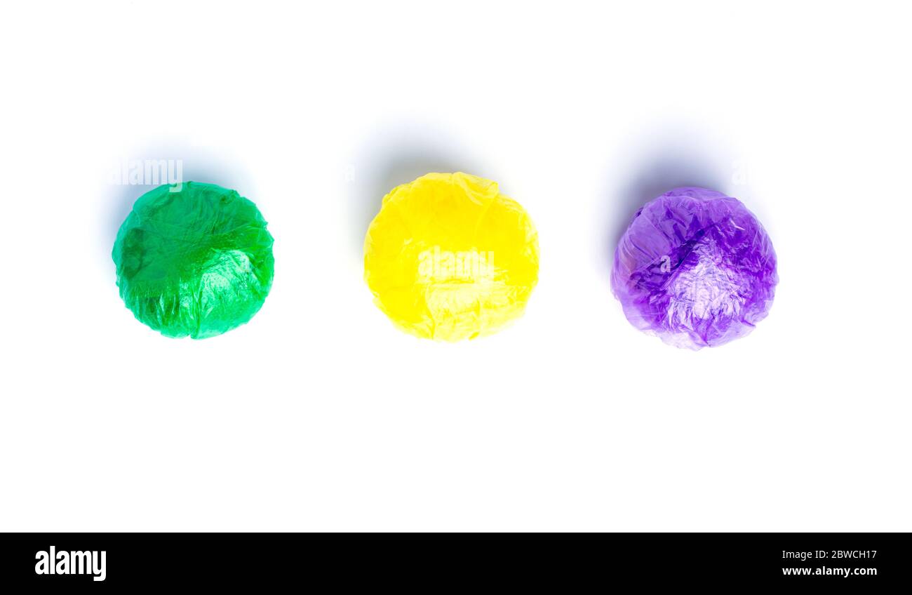 Balls from Multi-colored disposable plastic bags on white background Stock Photo