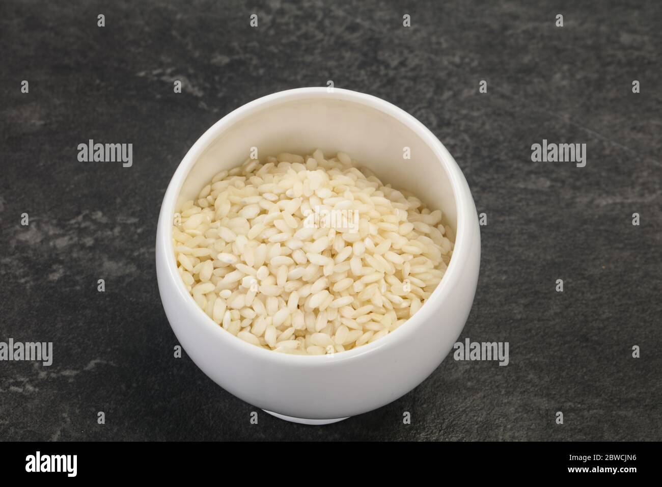 Raw Arborio rice for Italian risotto Stock Photo Alamy