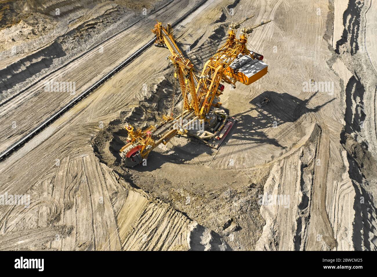 Bucket-wheel excavator for surface mining in a lignite quarry, Heavy industry.  Stock Photo