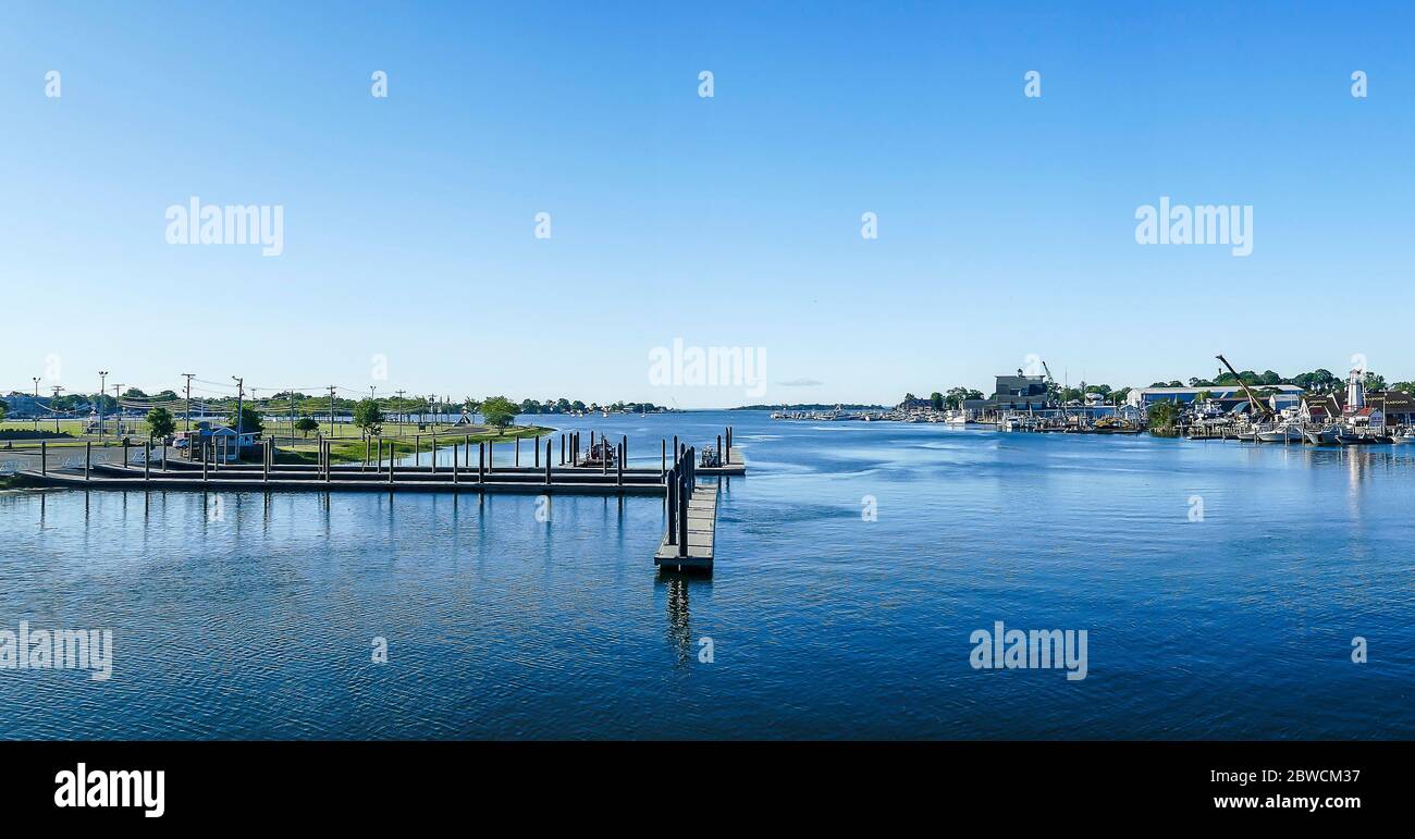 NORWALK, CT, USA -MAY 31, 2020:  Panoramic view from bridge at South Norwalk in beautiful sunny morning with clear blu sky Stock Photo