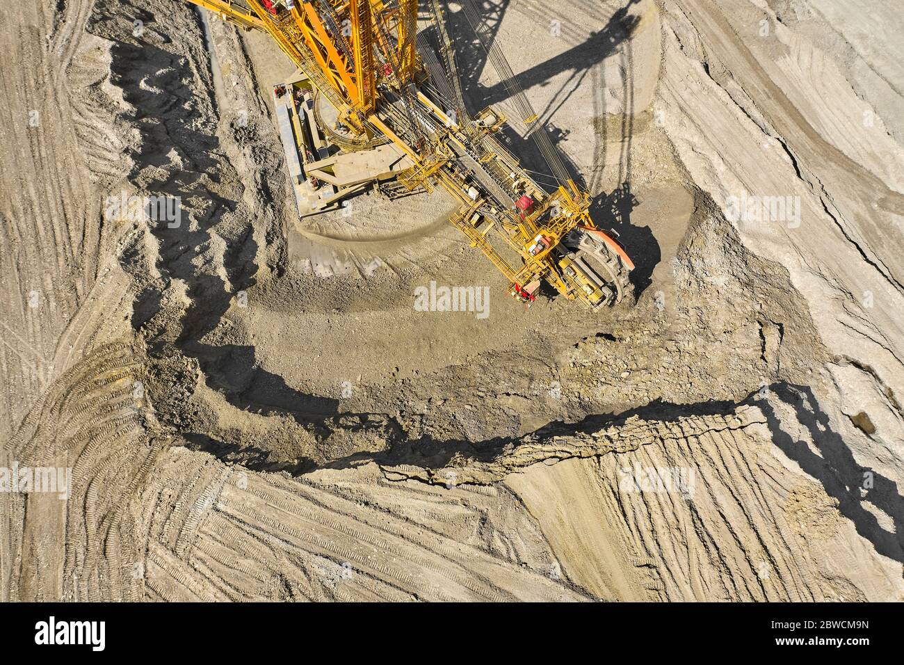 Bucket-wheel excavator for surface mining in a lignite quarry, Heavy industry.  Stock Photo