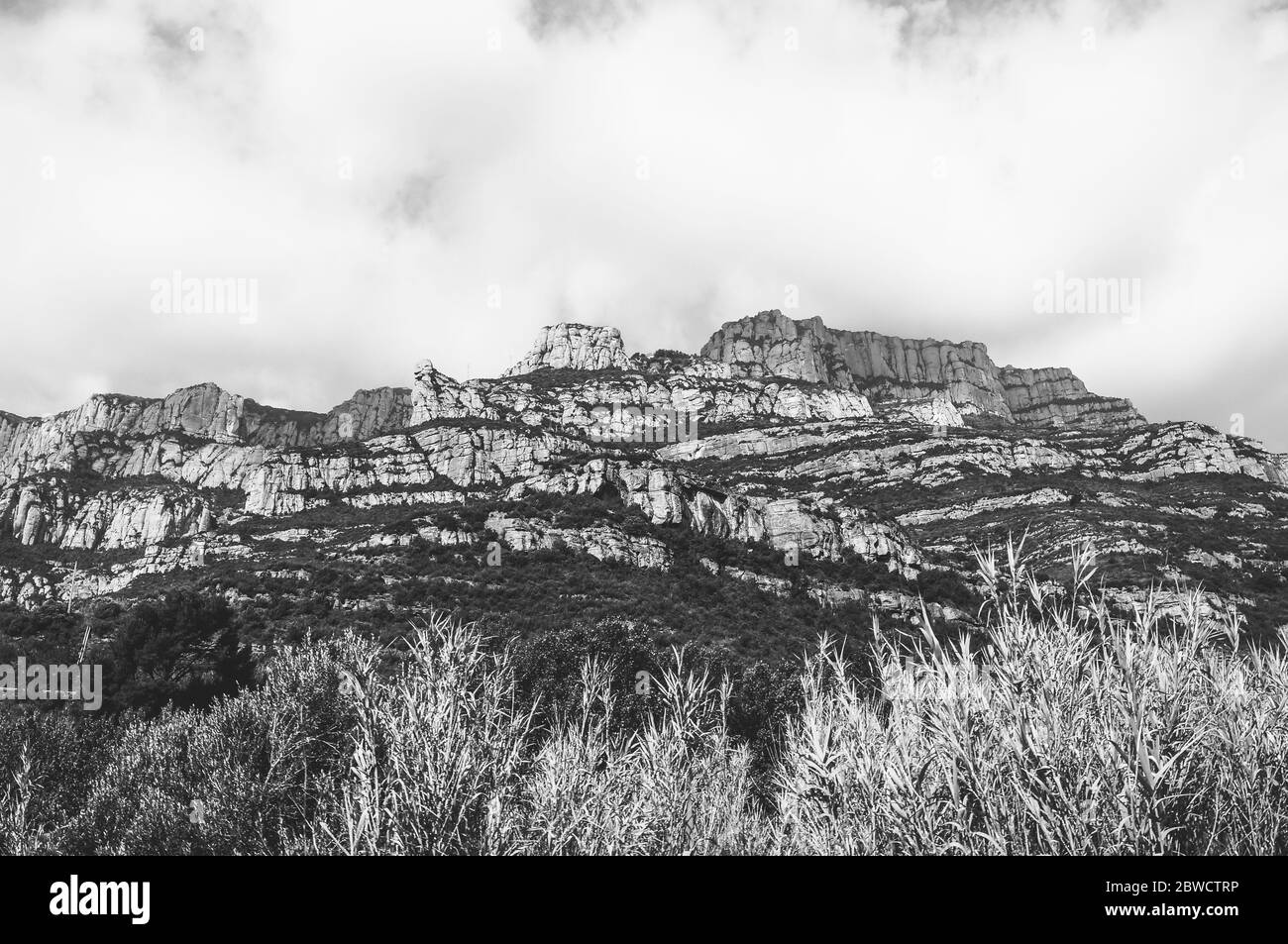 Hiking in the sandstone mountains of Montserrat near Barcelona Stock Photo