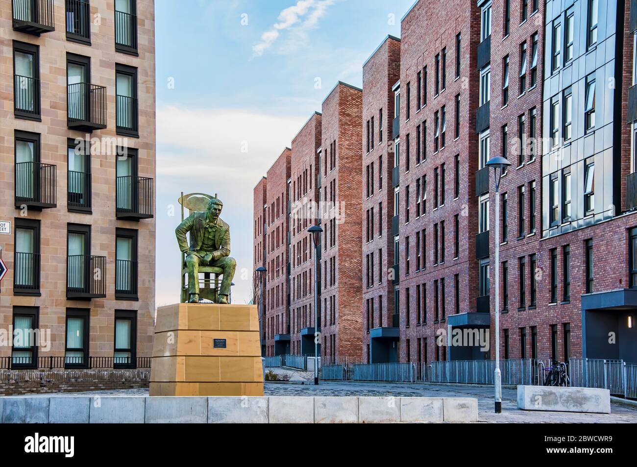 Charles Rennie Mackintosh statue in housing development in Anderston area of Glasgow Scotland. Stock Photo